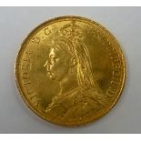 An 1887 gold two pound coin.