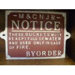 A cast metal reproduction railways fire bucket sign.