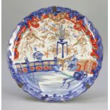 TellerJapan, 19. Jahrhundert. - Imari - Porzellan. Polychrom bemalt. D. 46,5 cm. Blaue Ringmarke.