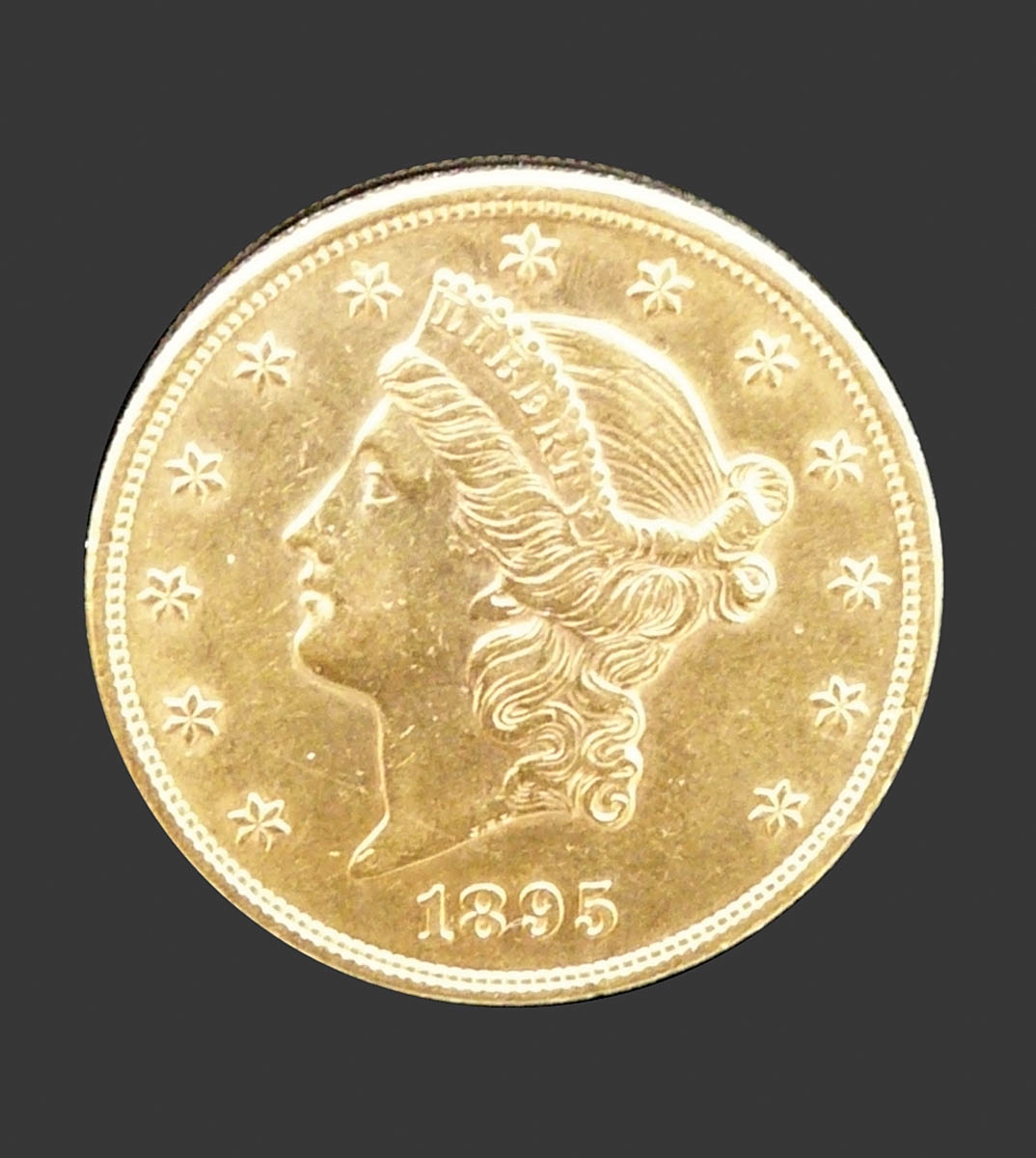 20 DollarUSA, 1895. 900er GG. D. 34 mm. Gew. 33,43 g. SS. Vs. Liberty mit Jahreszahl. Rs. Adler