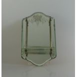 Wandspiegel um 1920, geschliffenes Glas mit Metallmontur, 30cm x 17cmMindestpreis: 30 EUR