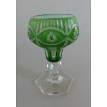Glaspokal Böhmen, dickwandiges Überfangglas auf facettiertem Fuß, h. 15cmMindestpreis: 30 EUR