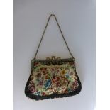 Abendtasche um 1920, Petit-Point-Stickerei, schwarzgrundig, farbiges Blumenmuster, ca.18cm x