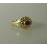 Damenring, 585 Gelbgold, mittig Rubin umgeben von 10 Diamanten, RG 18mm, 6,1gMindestpreis: 340 EUR