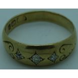 Gold ring set with 3 diamonds