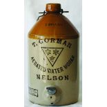 1 Gallon Stoneware Jar advertising, T GORMAN AERATED WATER WORKS NELSON, 3 stars in triangle tm,