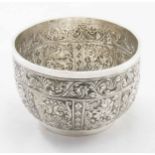 Late 19th early 20th c Eastern silver bowl with raised deity animal and scroll foliage relief 4ins D