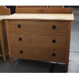 Early 20th c Edwardian oak three drawer graduated chest with black metal ring handles on turned legs