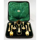 Victorian period HM Silver gilt tea strainer and sugar tong set with six matching teaspoons with