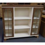 Original Art Deco stripped walnut and painted side by side book display cabinet with open shelves