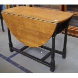 Early 20th C oak drop leaf table with black satin supports upcycled by JD Designs Open Size 42 x 54"