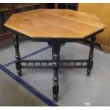 Late 19th C octagonal centre table with mahogany top painted supports in satin black upcycled by