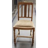 Set of four Art Deco honeyoak dining chairs with rail back design re upholstered drop in seats