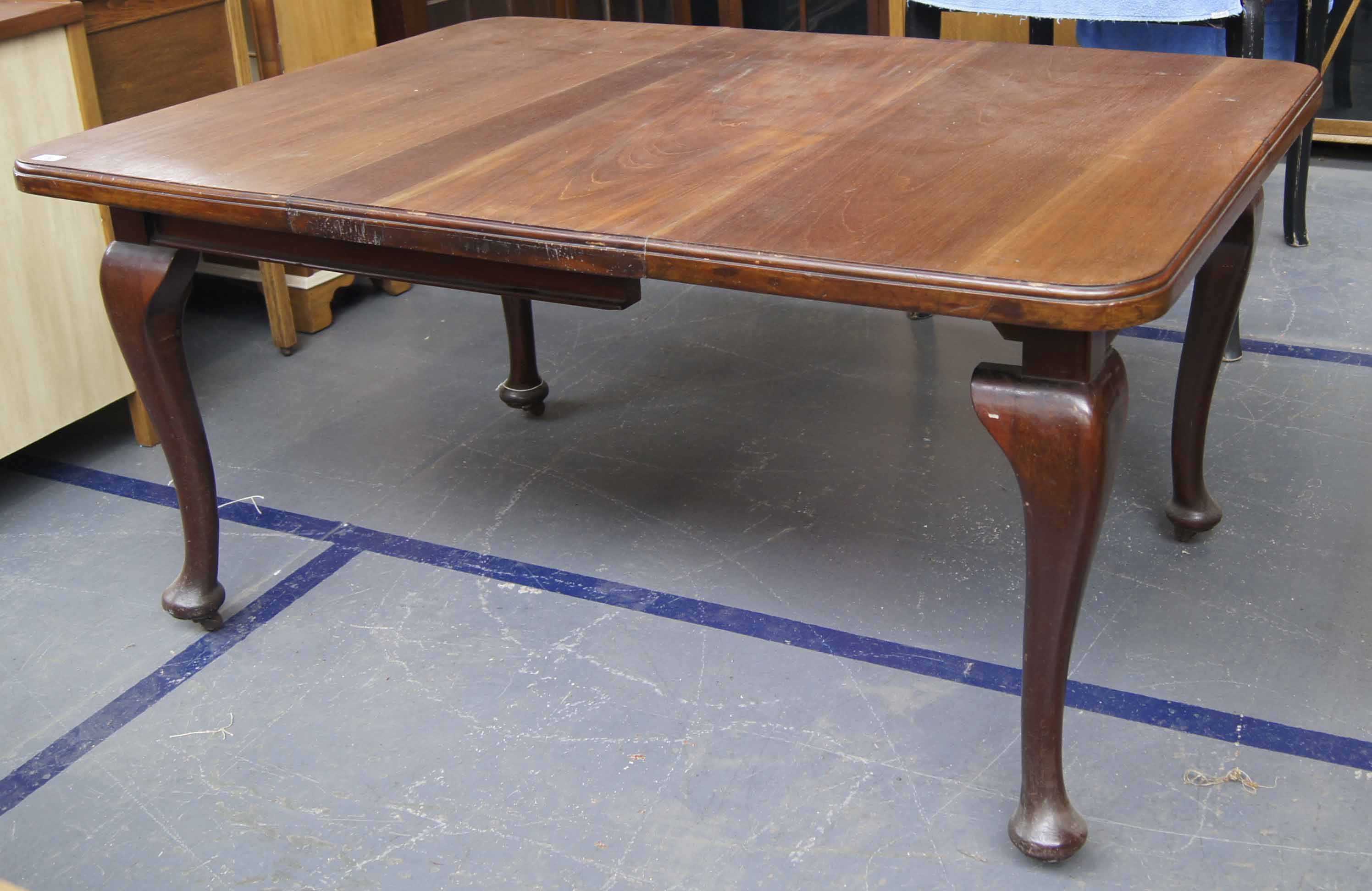 Late 19th C mahogany extending wind-out table on Queen Anne style legs original castors  Open Size