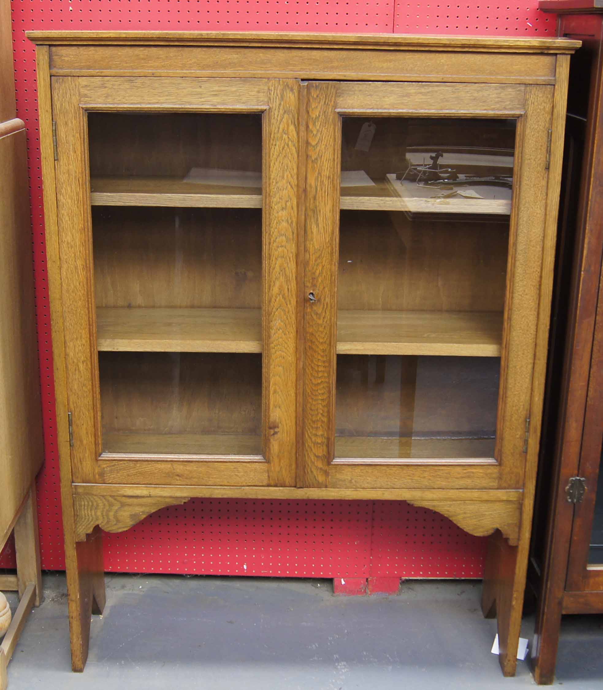 Late 19th early 20th c arts and crafts design oak book display cabinet with integral wood shelves