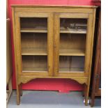 Late 19th early 20th c arts and crafts design oak book display cabinet with integral wood shelves