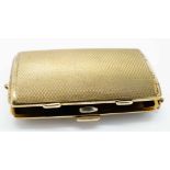 Early 20th c 9ct gold ladies cigarette/cosmetic case with engine turn relief and makers mark to