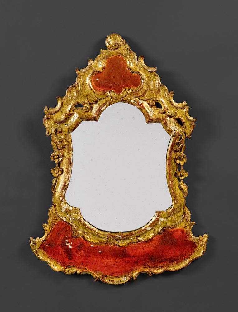 PAINTED MIRROR, Baroque, Italy, 18th century. Wood, carved with rocailles and leaves, painted red