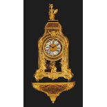 IMPORTANT BOULLE CLOCK WITH PLINTH, late Regency, Paris, 19th century. Red tortoiseshell, richly