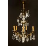 CHANDELIER, in the Baroque style. Pear-shaped, brass frame with 6 curved light branches. Glass