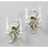 PAIR OF SCONCES, Rococo style, Dresden. Porcelain, modelled and painted with flowers and leaves, and