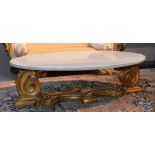 OVAL COFFEE TABLE, Baroque style, 19th century. Wood with leaf carving and gilt. Oval marble top.