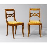 PAIR OF CHAIRS, Restoration. Walnut. Padded seat. Pierced backrest. Mustard-coloured, patterned
