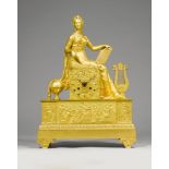 MANTEL CLOCK, Empire, Paris. Gilt bronze. Rectangular with a seated female figure, probably the