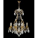 CHANDELIER, Baroque style, 20th century. Pierced, curved gilt metal frame with 8 light branches.