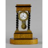 PORTAL CLOCK, Charles X, France. Rosewood, inlaid with tendrils. White enamel dial and bronze