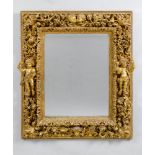 IMPORTANT MIRROR, Baroque style, Italy, 19th century. Wood, opulently carved with flowers, leaves,