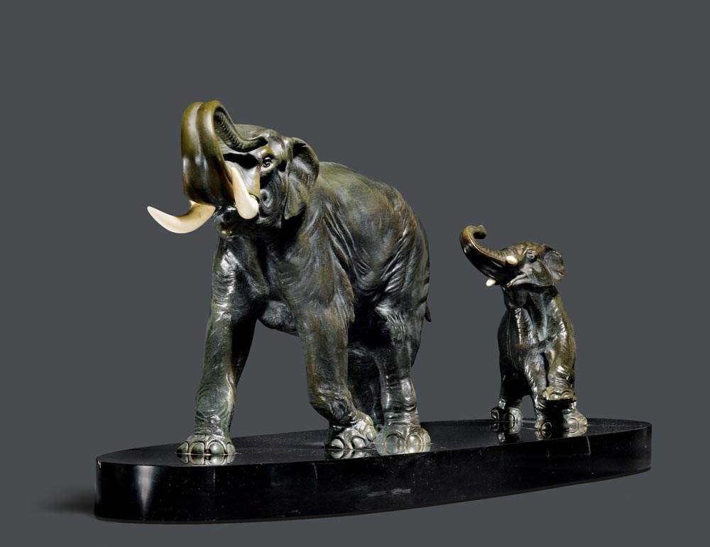 IRENEE ROCHARD (1906-1984) SCULPTURE, ca. 1940 Bronze and ivory. Two elephants, on a black marble