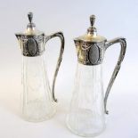 Zwei Jugendstil Glaskaraffen mit SilbermonturenZwei Jugendstil Glaskaraffen mit Silbermonturen,