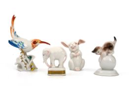 4 Miniatur-Tierfiguren, Rosenthal um 1930  Polychrom staffiert. Bestehend aus: Lachendem Hasen,