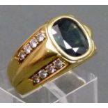 Damenring
18 kt. Gelbgold, 1 Blautopas, 16 Brillanten, zusammen ca. 0,40 ct., ca. 
 14 g., RM 55,