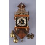 WANDUHR 19. JH, Holzgehäuse mit Metallapplikationen, Pendel und Gewichten, rest.-bed., 48x 21 x 15