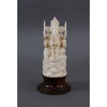 ELEFANTEN GOTT INDRA Indien, wohl 19. JH, Elfenbeinskulptur des Gottes auf Holzsockel, H16 cm