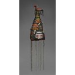 A YORUBA BEADED CROWN  Of conical form, surmounted by a bird, the whole covered with strands of