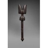 A YORUBA STAFF FOR SHANGO  Oshe Shango, with bands of incised geometric ornament about the shaft,