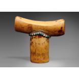 A DINKA IVORY HEADREST  Of T-form, the short curved top on cylindrical support with inset band of