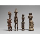 FOUR BENA LULUA SMALL FIGURES Two half figures with conical fetish cavity on top of the head, and