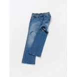 Joseph BeuysDas Orwell-Bein - Hose für das 21. Jahrhundert Jeans trousers with two round holes.