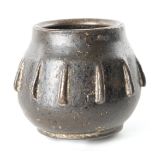 Small lost-wax cast bronze mortar.  It has a rounded shape with twelve ribs.  Morisco Hispanic