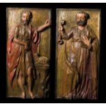 "Saint Peter and Saint John the Baptist". Pair of carved polychrome and gilt reliefs. 17th