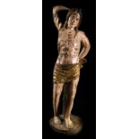 "Saint Sebastian".  Polychrome and gilt carved wooden sculpture.  Castilian school.  16th