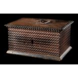 Walnut wood box with ironwork. 17th century.   Carved curvy zigzag decoration.  Attractive gilded