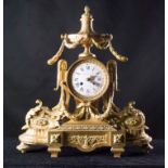 Gilded bronze clock.  France.  19th century. It has a small flaw in the enamel of the face.   50 x