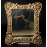 Mirror with patinated wood and stucco frame. Art Nouveau.  From around 1900. The patina is a later