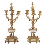 A PAIR OF REGENCY ORMOLU FOUR BRANCH CANDELABRA A PAIR OF REGENCY ORMOLU FOUR BRANCH CANDELABRA,