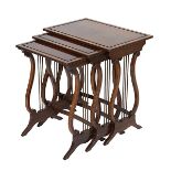 A NEST OF THREE YEW WOOD SIDE TABLES IN THE REGENCY STYLE A NEST OF THREE YEW WOOD SIDE TABLES IN